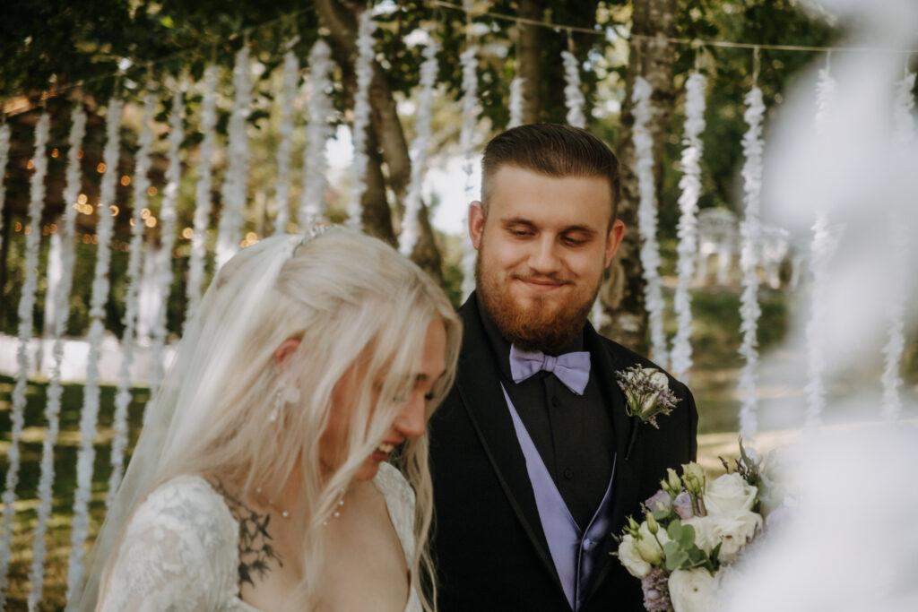 The emotion of the day, bride and groom share love and laughter with their family. Cinematic and documentary style wedding photography