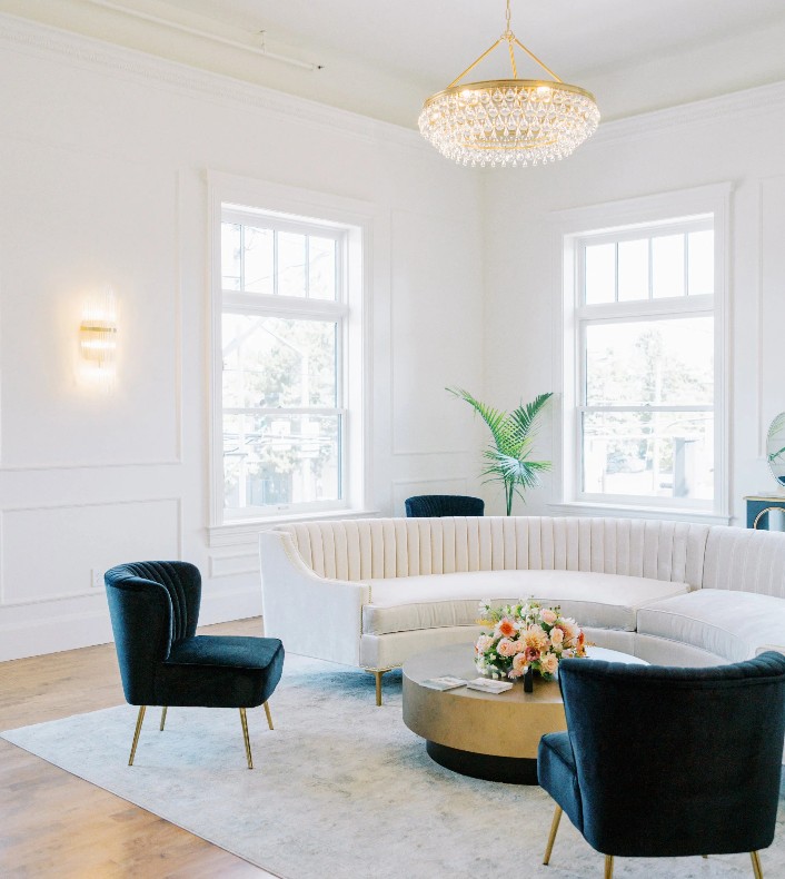 Black and white getting-ready suite at The Arc Light with leather furniture