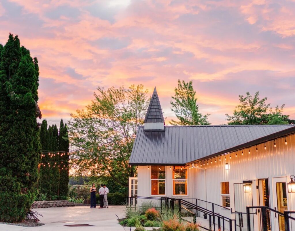 Aurora Vineyards wedding venue in Aurora Oregon with vineyard and mountain views, romantic indoor and outdoor ceremony spaces, and award-winning wine
