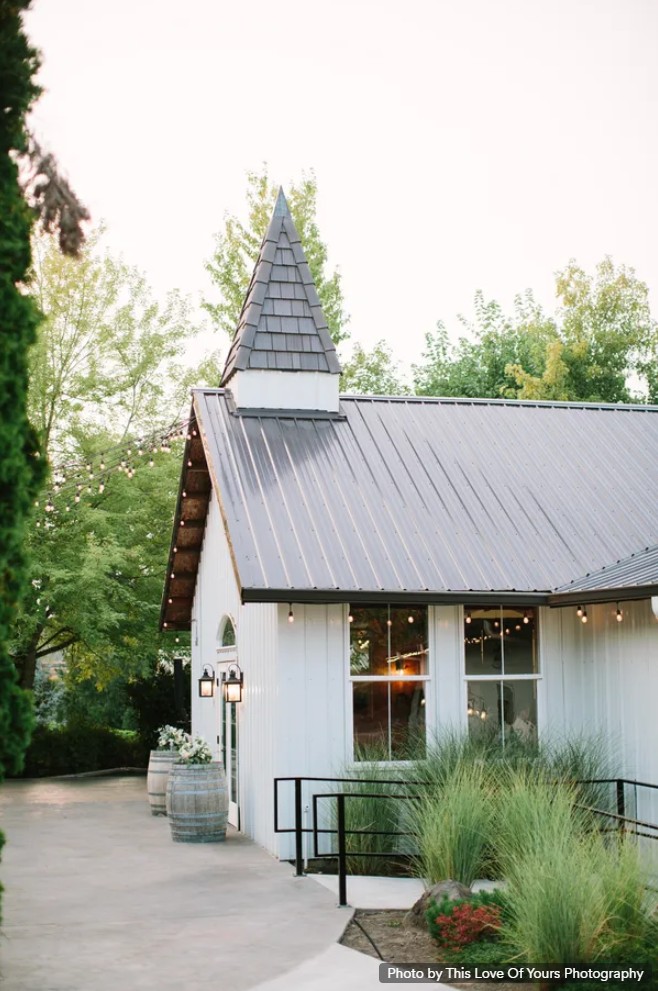 Aurora Vineyards wedding venue in Aurora Oregon with vineyard and mountain views, romantic indoor and outdoor ceremony spaces, and award-winning wine