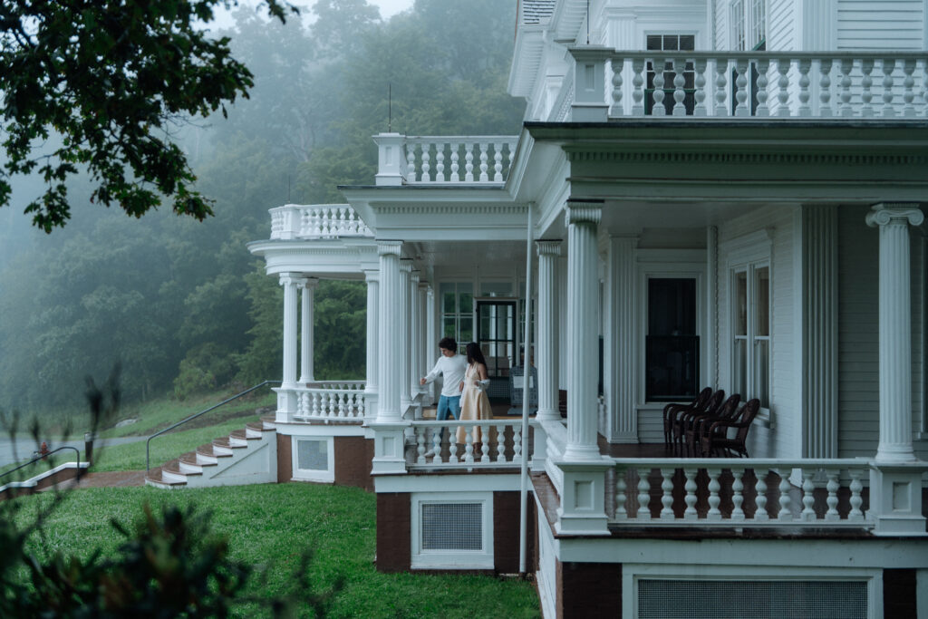 Moody North Carolina engagement photos captured at the couple’s proposal spot in the Smoky Mountains, surrounded by fog and soft overcast light. Romantic and cinematic portraits by destination wedding and engagement photographer KNCAPTURES. Moses Cone