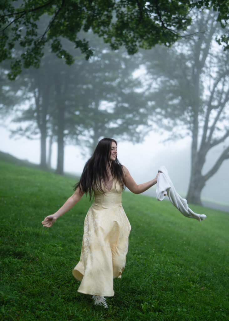 Moody North Carolina engagement photos captured at the couple’s proposal spot in the Smoky Mountains, surrounded by fog and soft overcast light. Romantic and cinematic portraits by destination wedding and engagement photographer KNCAPTURES. Moses Cone