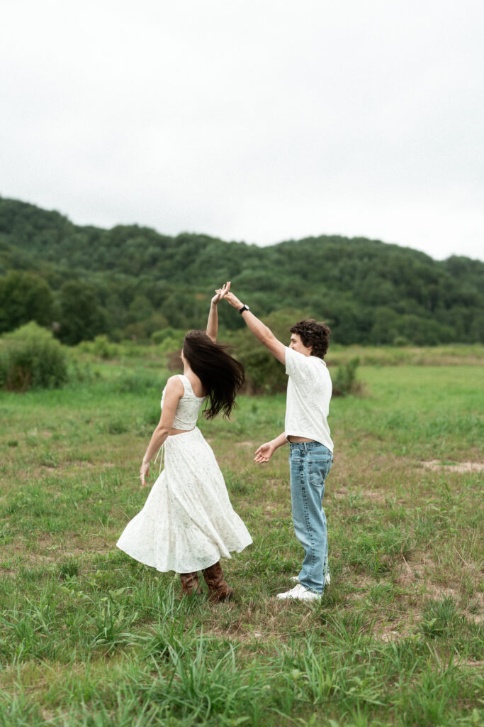 Engagement session in a misty mountain park in North Carolina, captured after the rain with soft, diffused light and natural tones. Emotional, candid moments by destination wedding photographer KNCAPTURES