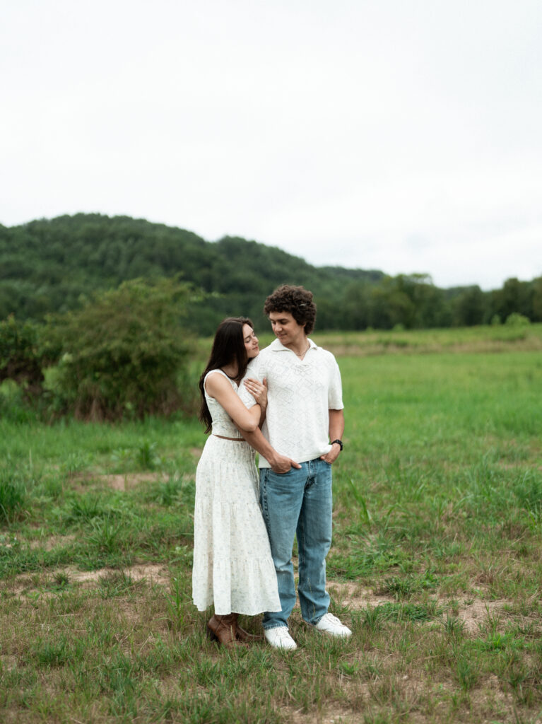 Engagement session in a misty mountain park in North Carolina, captured after the rain with soft, diffused light and natural tones. Emotional, candid moments by destination wedding photographer KNCAPTURES