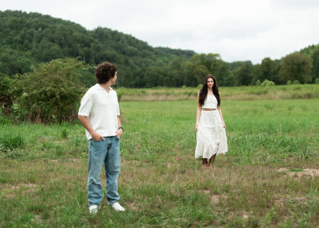 Engagement session in a misty mountain park in North Carolina, captured after the rain with soft, diffused light and natural tones. Emotional, candid moments by destination wedding photographer KNCAPTURES