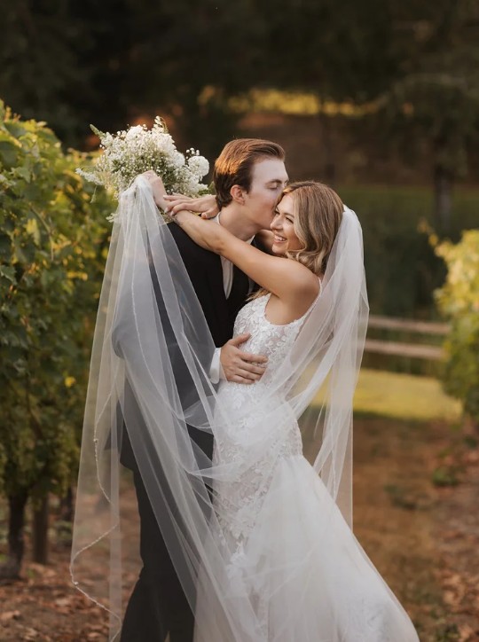 Editorial bridal portraits with vineyard backdrop