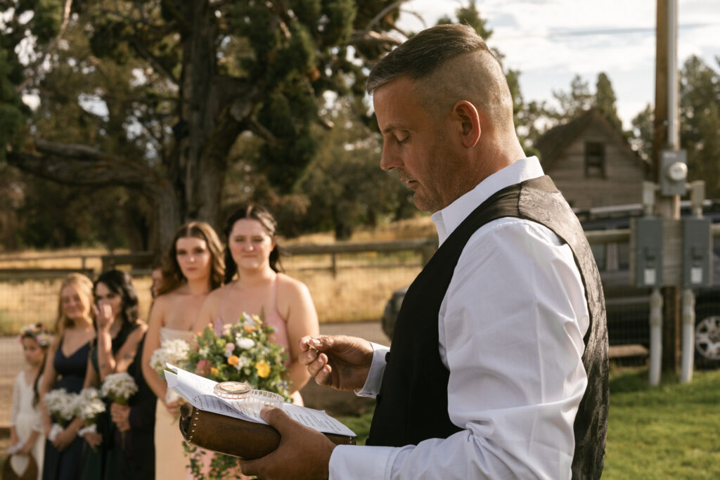 father handing off bride at wedding bend oregon 