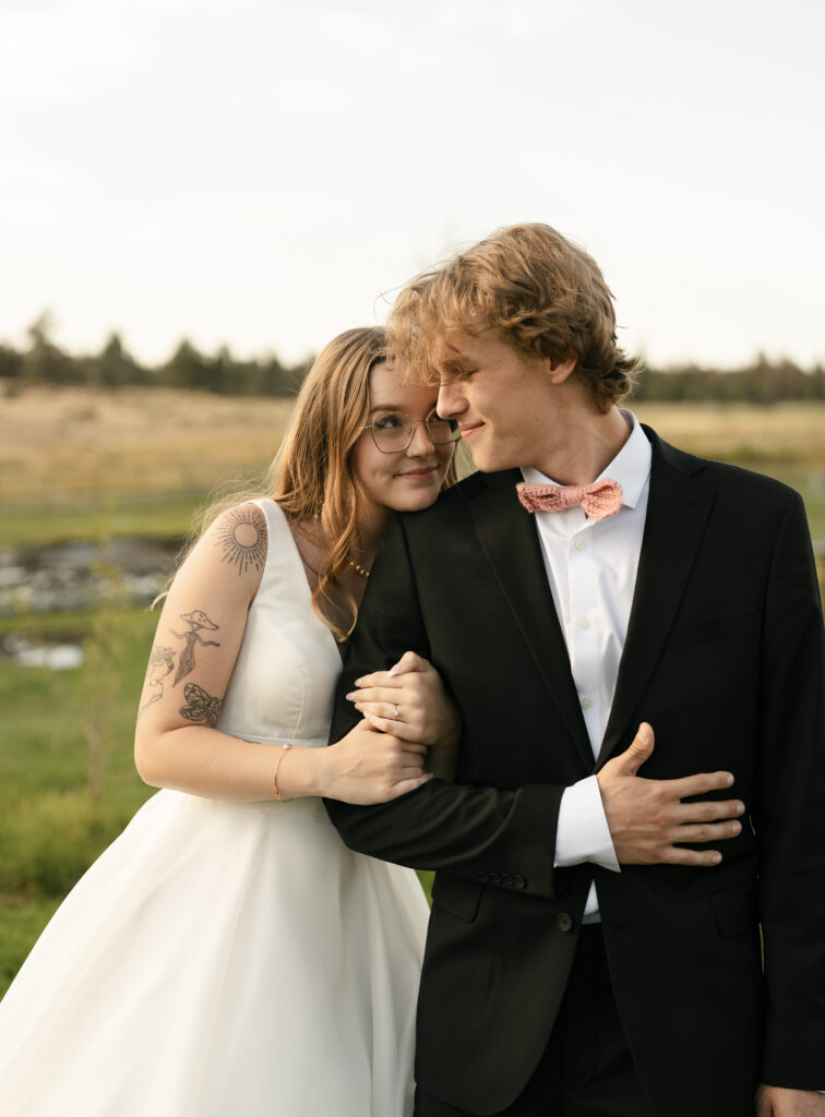 couple photos wedding bend oregon private vows and kissing wedding photography