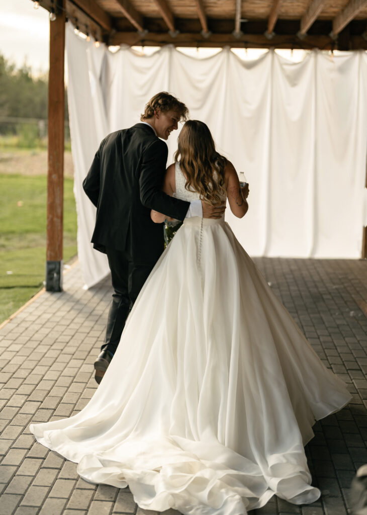 couple photos wedding bend oregon private vows and kissing wedding photography