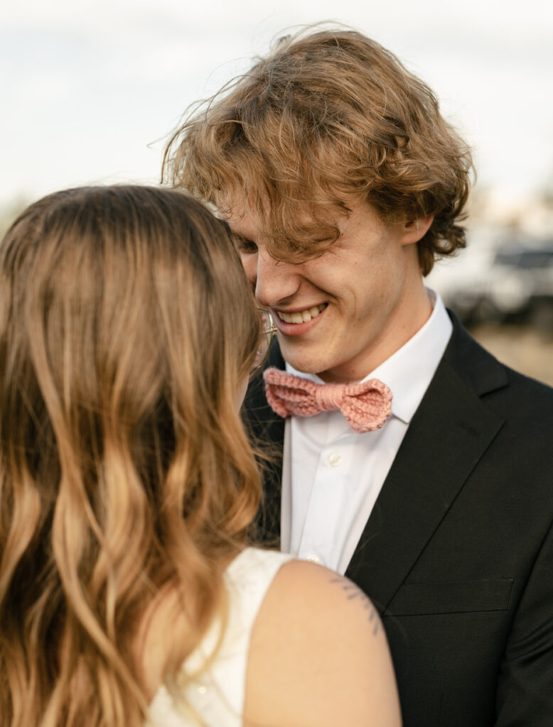 couple photos wedding bend oregon private vows and kissing wedding photography