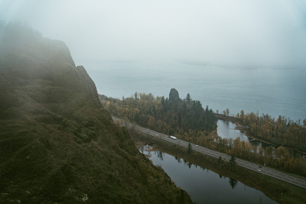 Couple embracing at Crown Point Vista House overlooking the Columbia River Gorge in OregonCouple embracing at Crown Point Vista House overlooking the Columbia River Gorge in Oregon