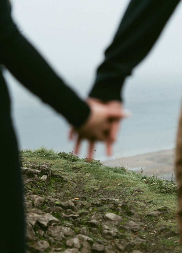 Couple embracing at Crown Point Vista House overlooking the Columbia River Gorge in Oregon
