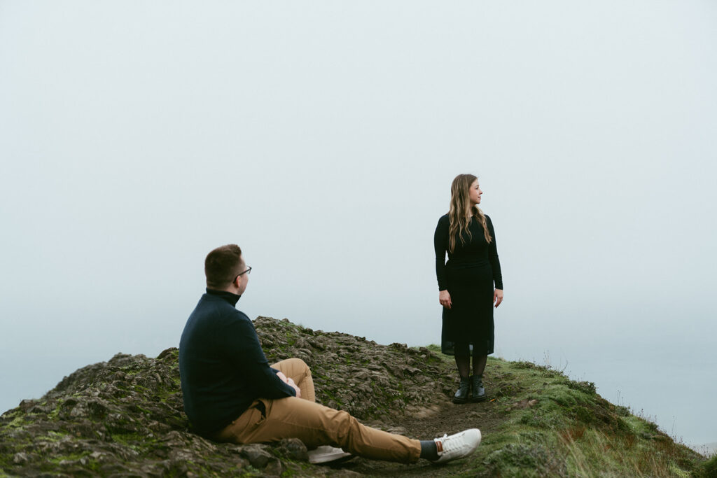 Couple embracing at Crown Point Vista House overlooking the Columbia River Gorge in Oregon