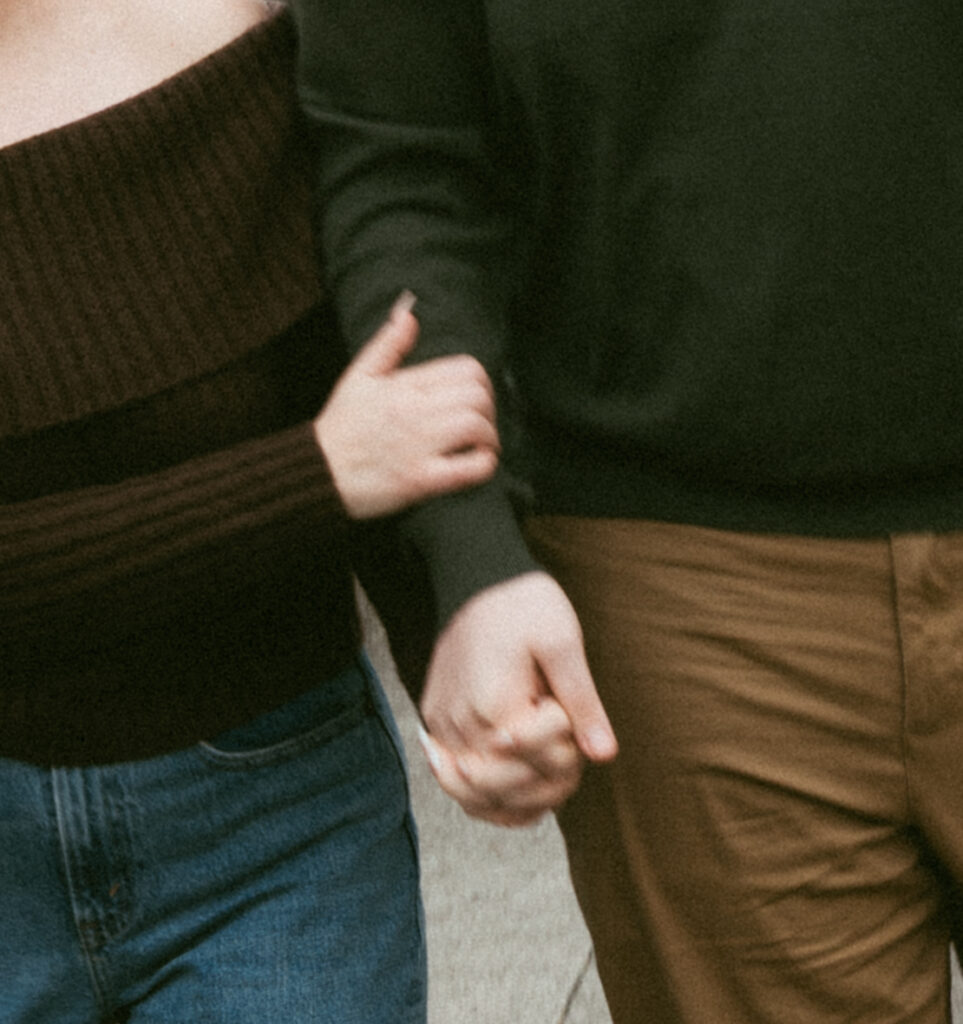 Couple embracing at Crown Point Vista House overlooking the Columbia River Gorge in Oregon